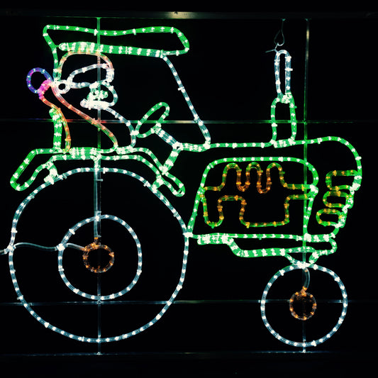 julenissen på grønn traktor