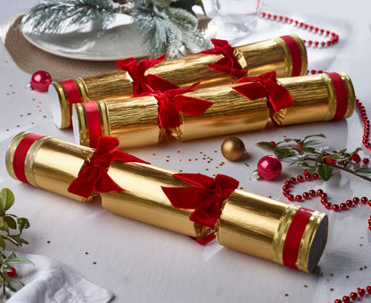 Julepynt smellbonbon i gull. Store med rød sløyfer og gaver